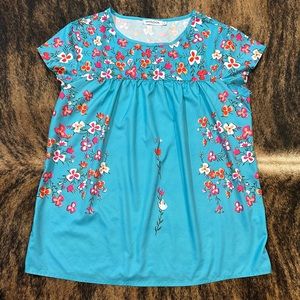 Size Large MISSLOOK blue blouse with red, white, and orange floral design